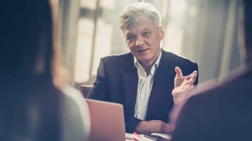 Lawyer Meeting With Two Clients Stock Photo