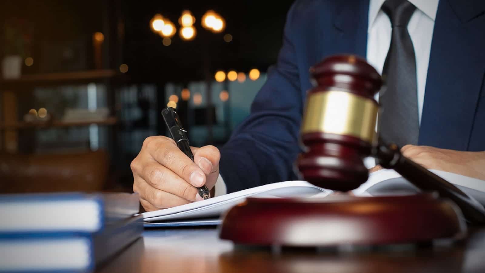 Attorney Signing Legal Documents Stock Photo