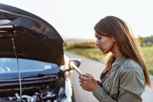 woman calling a lawyer after a car accident