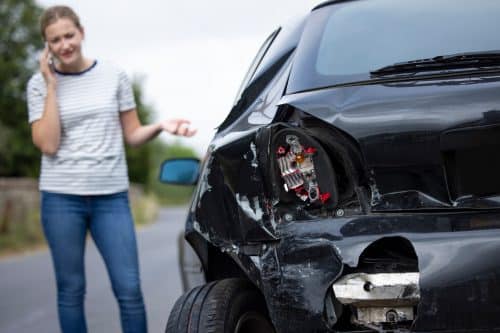 a woman calling for help after a car accident in Mobile, AL