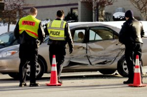 police responding to the scene of a Mobile, AL, car accident