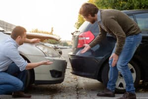 two men arguing over fault after a car accident in Mobile, AL